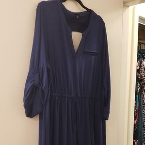 Beautiful navy dress with roll tab sleeves back cutout.